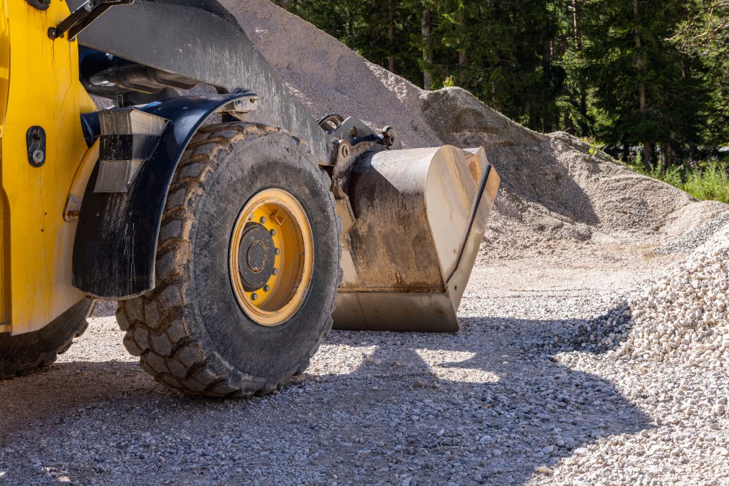 Adding PAM when building your gravel road can assist with long term stability, and reduce maintenance of your investment.